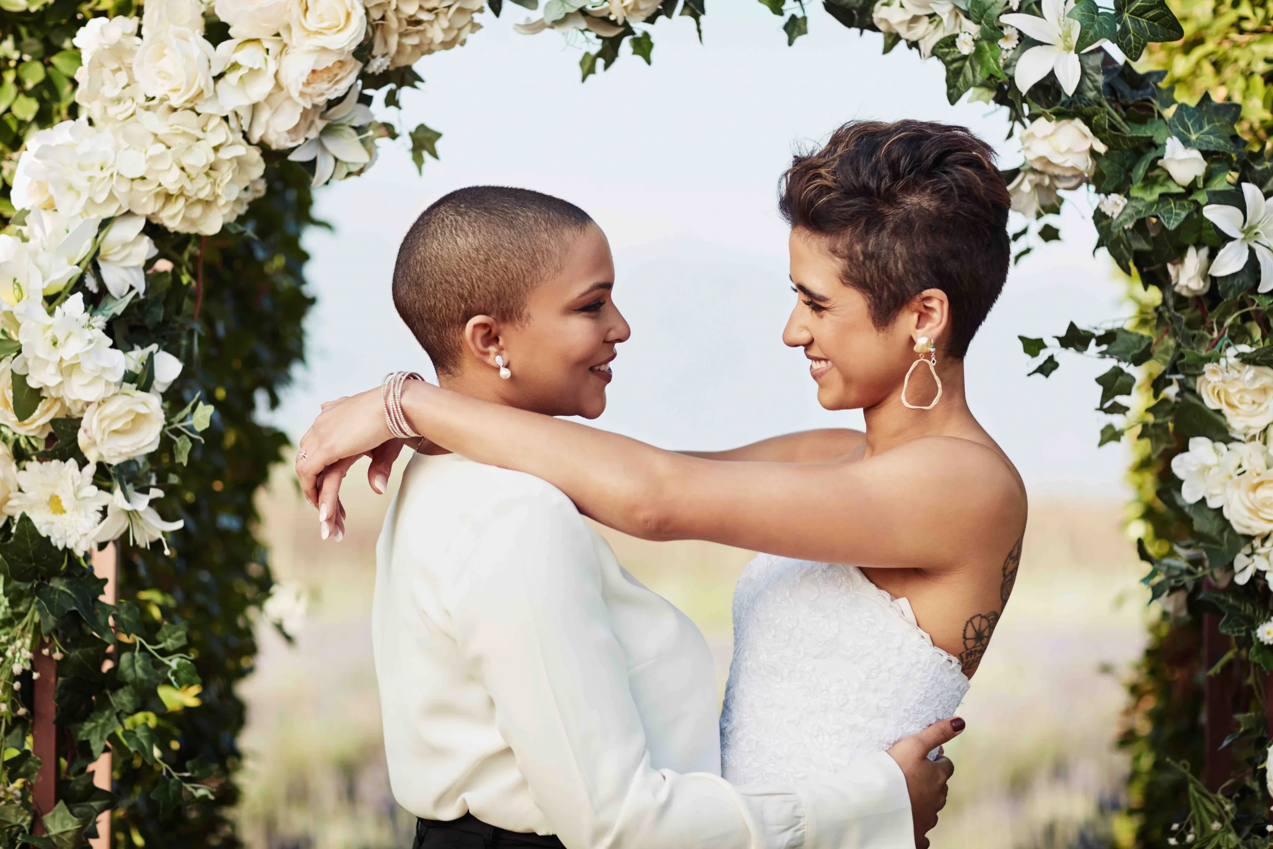 Mixed race lesbian couple wedding day